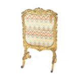 A 19th Century gilt Rococo style fire screen with needlepoint tapestry panel, 60cm wide x 101cm high