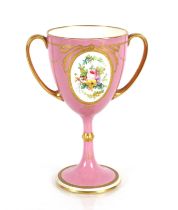 A 19th Century Minton's baluster cup, decorated with a finely painted foliate panel flanked by