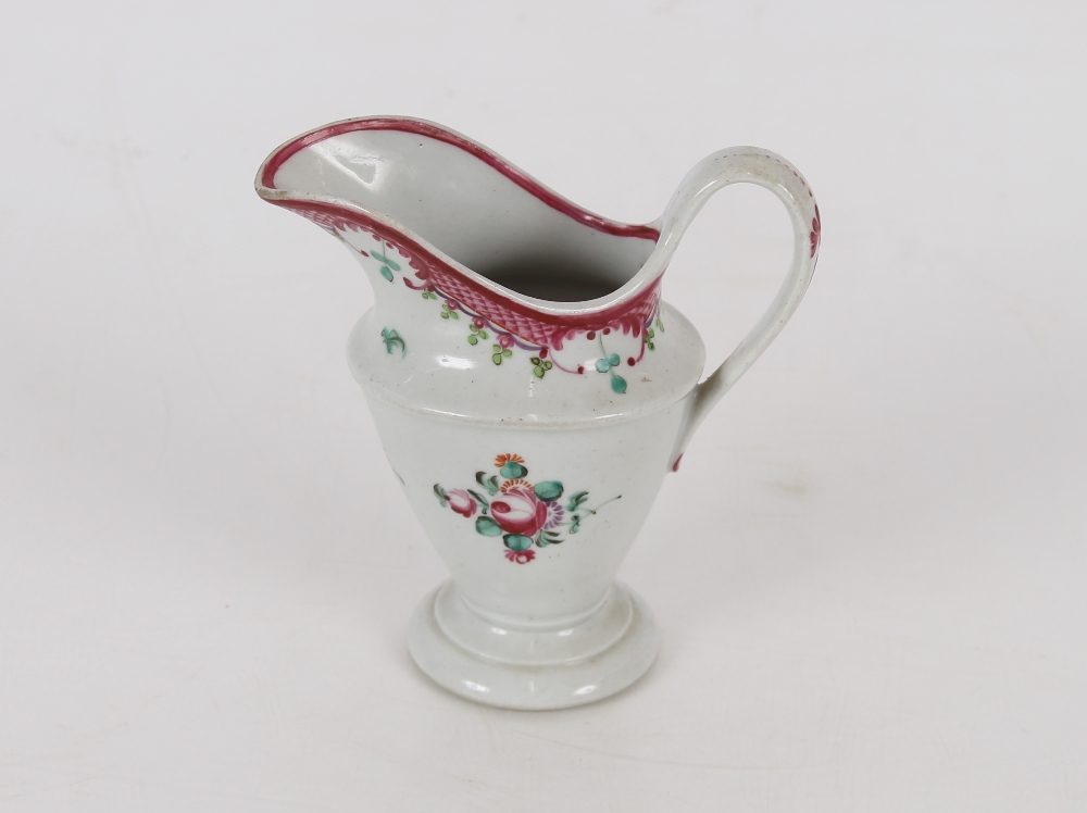 A Newhall porcelain cream jug, decorated in the traditional manner, mark to base No.273, 11cm high