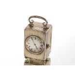 A miniature silver cased carriage clock, the movement inscribed W. Wordley, 129 Cannon Street