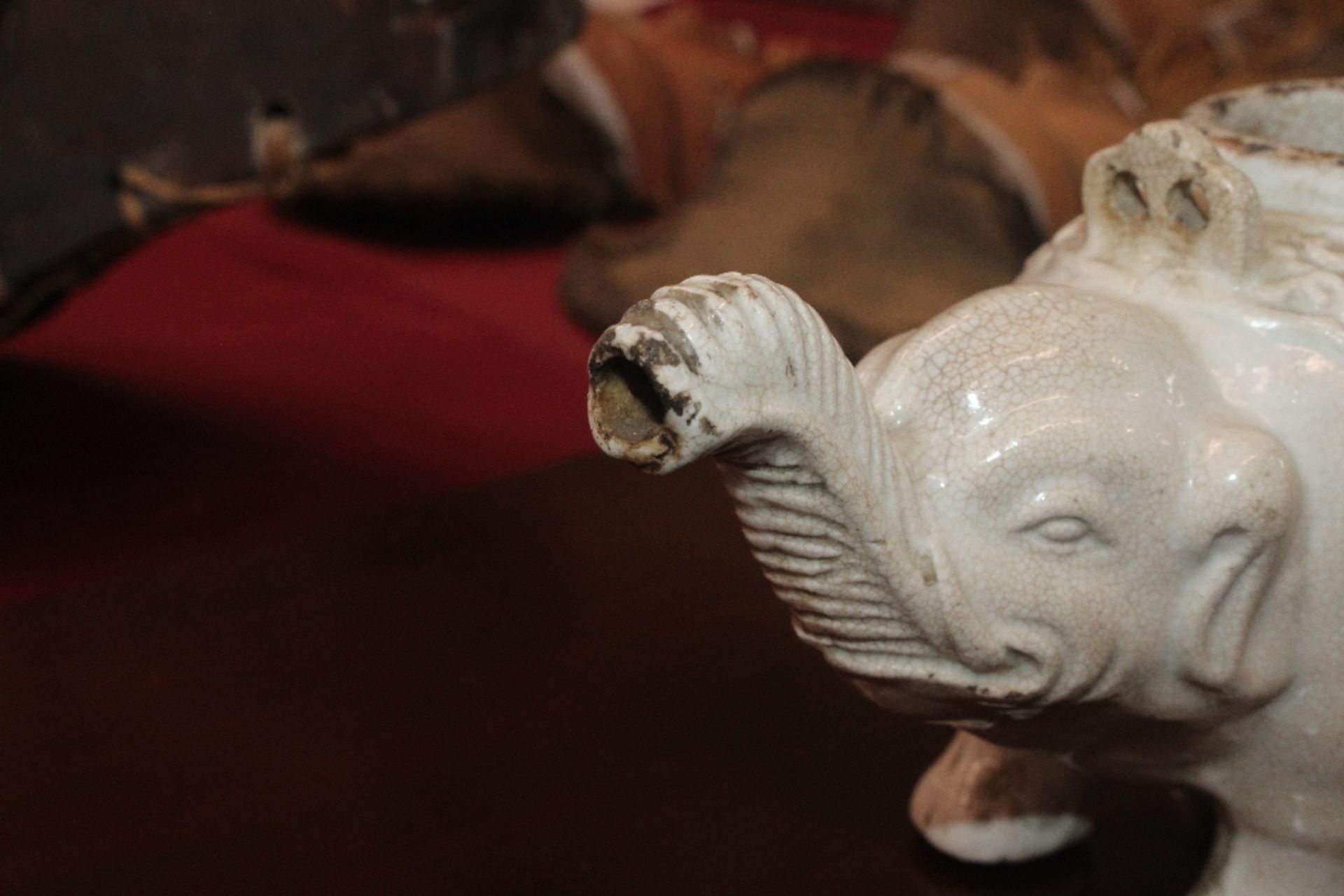 A Chinese blanc de chine water dropper in the form of an elephant, having moulded decoration to - Image 4 of 21