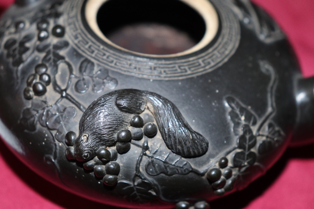 A Chinese black glazed teapot of squat form with raised animal and berry decoration, leaf shaped - Image 11 of 20
