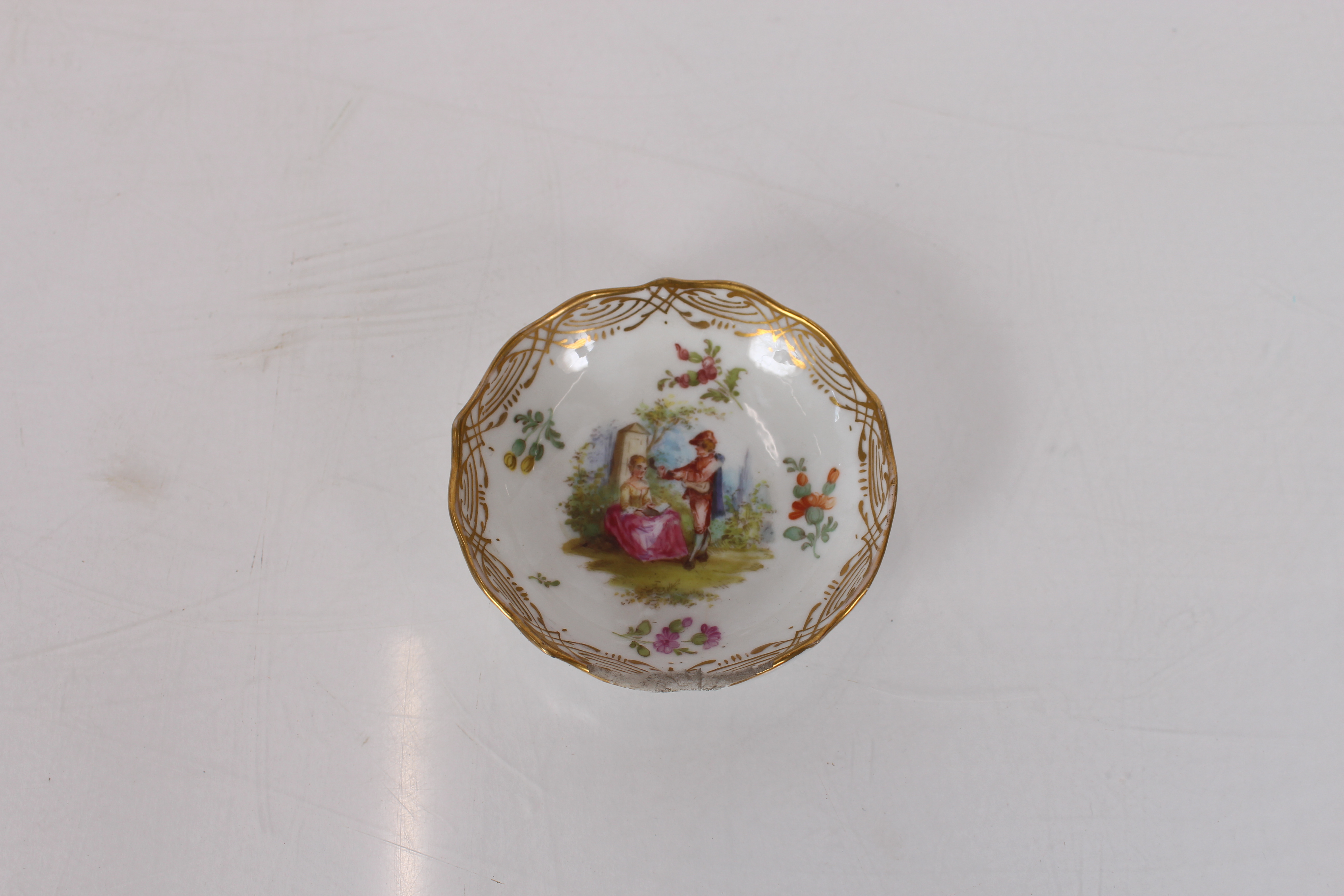 A Meissen inkwell on saucer shaped stand; a pair of matching chamber sticks AF; various miniature - Image 2 of 21