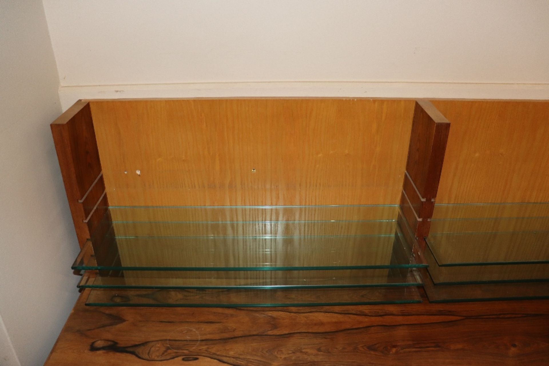 Desmond Ryan, a 1970's rosewood side cabinet fitted adjustable glass shelves and cupboards below, - Image 14 of 26