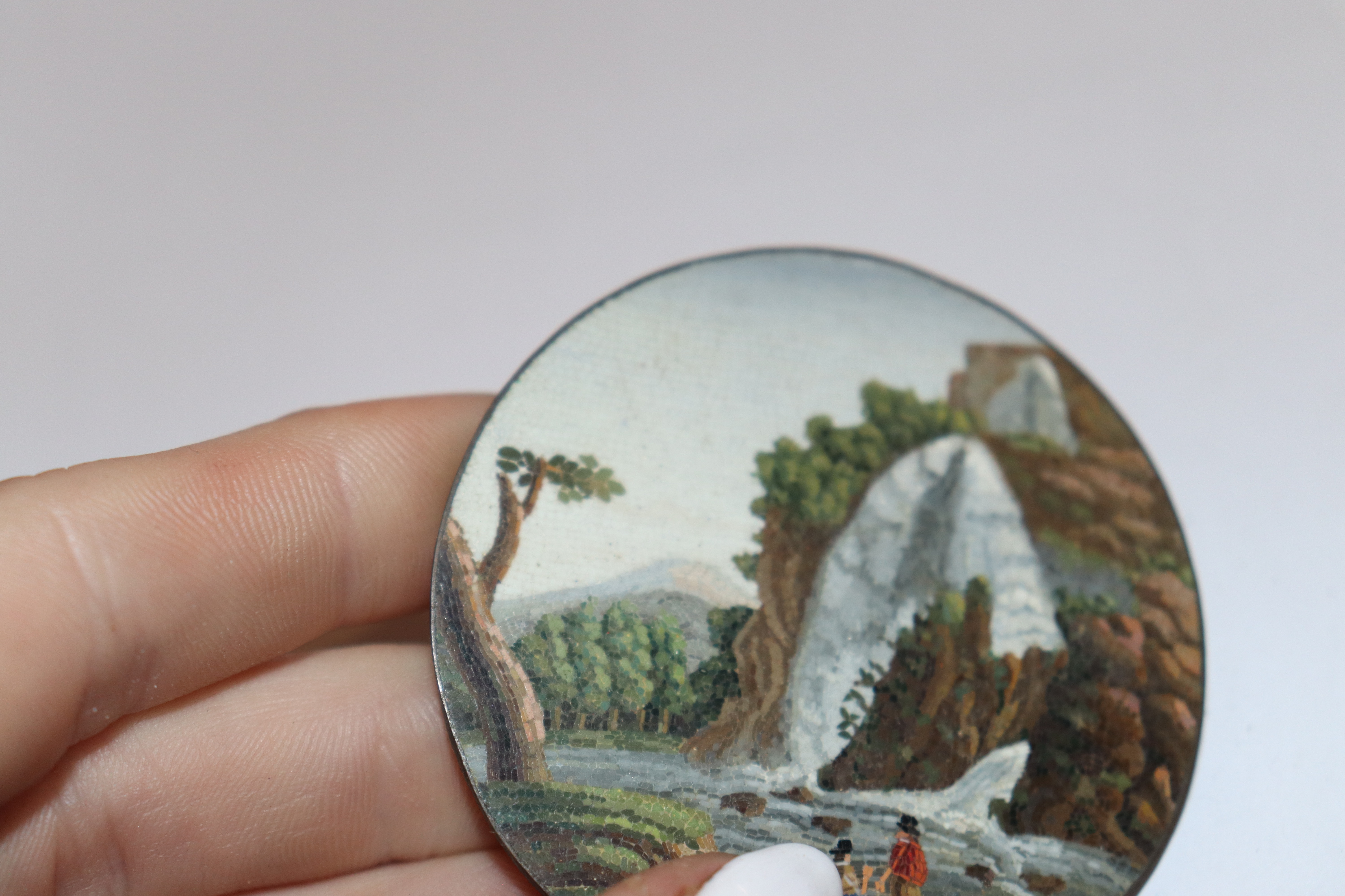 A miniature circular micro mosaic picture depicting figures in front of a waterfall; and a pair of - Image 10 of 11