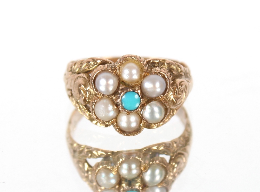 A 9ct gold turquoise and seed pearl set dress ring, 2.2gms