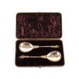 A cased pair of George V apostle serving spoons, Birmingham 1919, cased