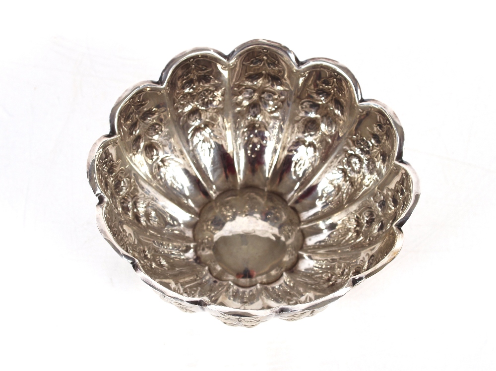 A late Victorian silver sugar bowl, the fluted form with raised floral and fruit decoration, - Image 2 of 3
