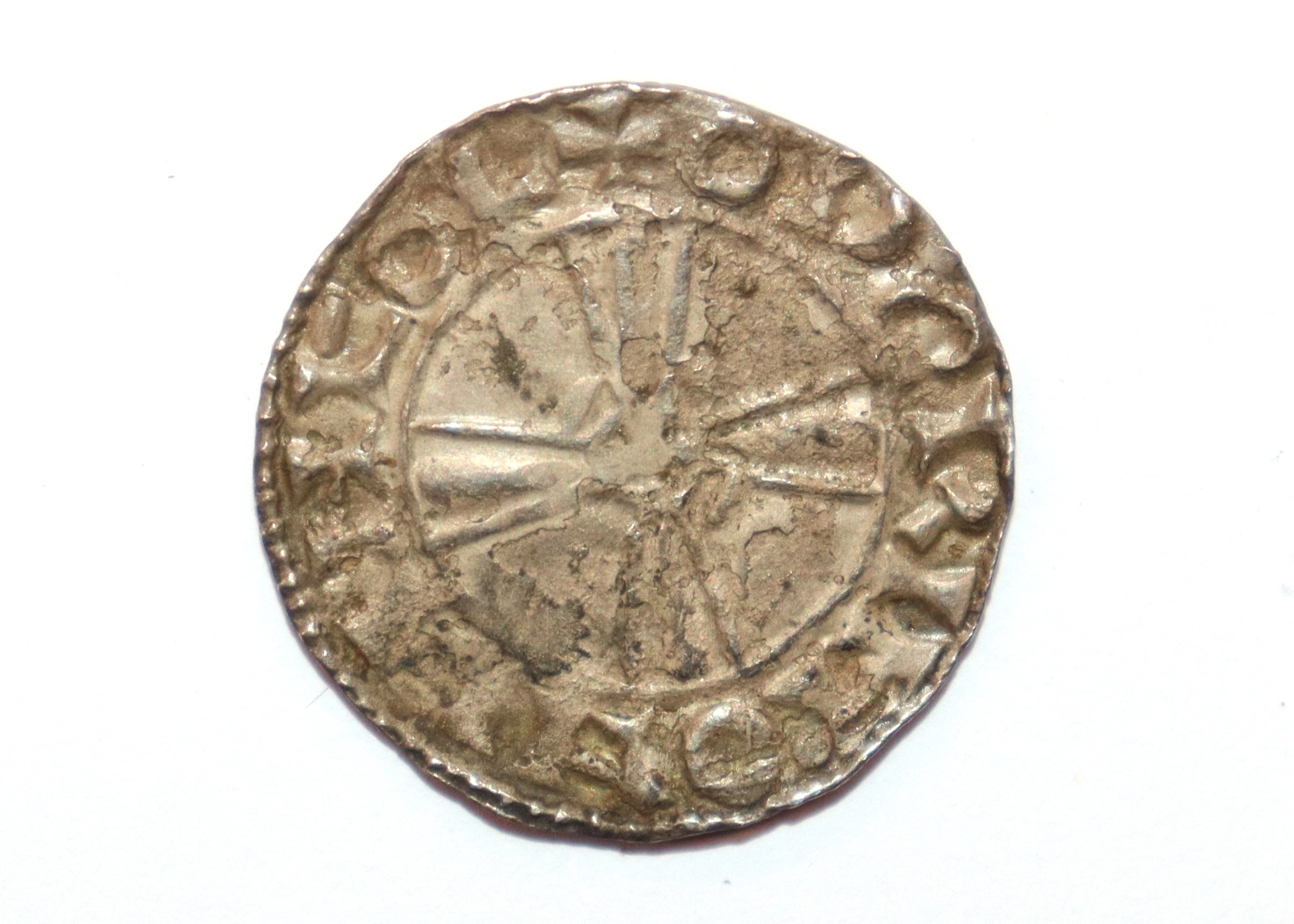 An Edward the Confessor (1042-1066) penny, expanding cross type
