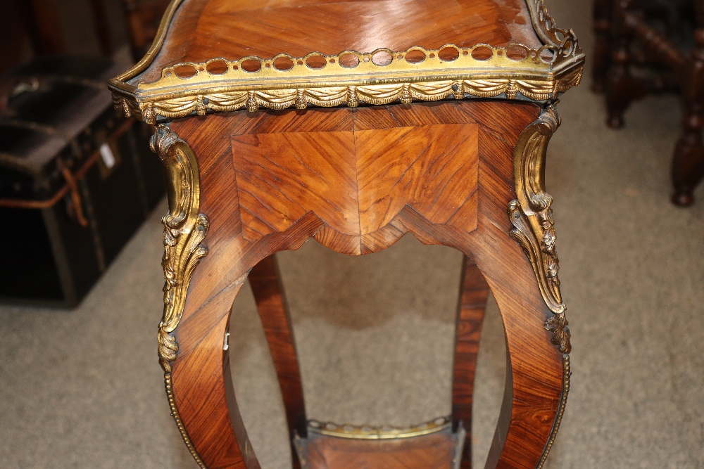 A pair of 19th Century French walnut and cross banded two tier side tables surmounted by pierced - Image 15 of 110