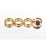 Three 22ct gold wedding bands, 16.7gms; and a 9ct