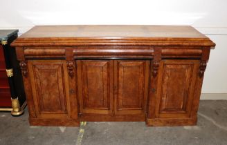 A 19th Century pollard oak and cross banded sideboard, of inverted breakfront form, fitted frieze