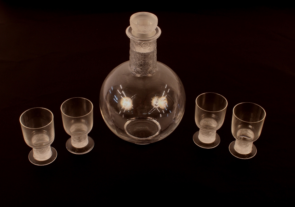 A Lalique "Chinon" decanter, 20cm high and four matching glasses, 7cm high , circa 1930, signed R.