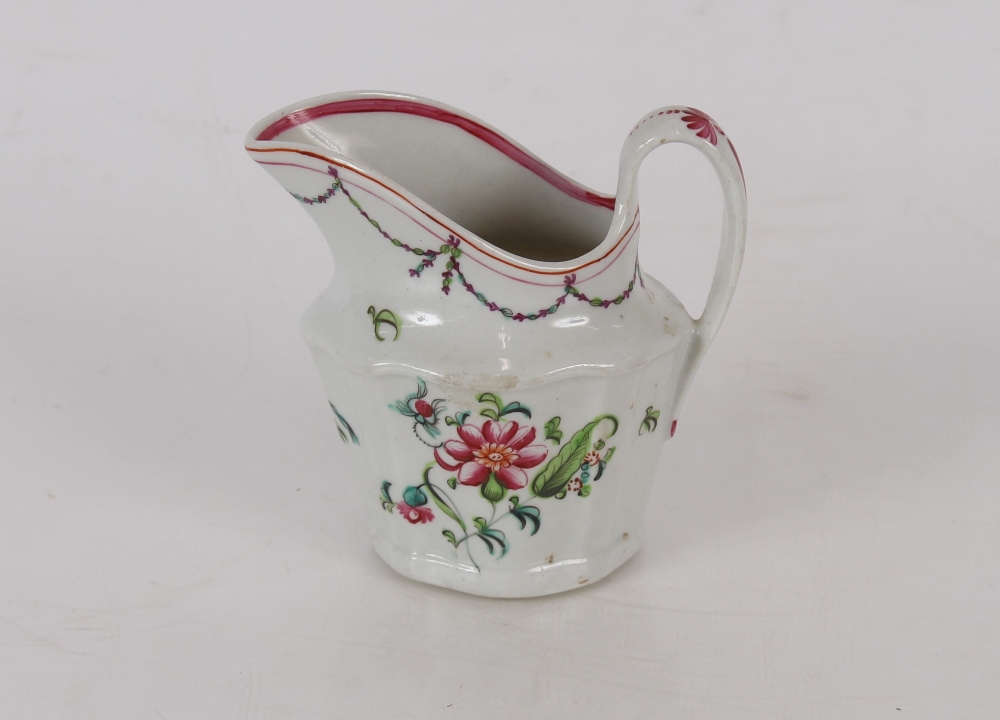 Newhall porcelain cream jug, decorated flowers and garlands, marked to base No.596, 11cm high