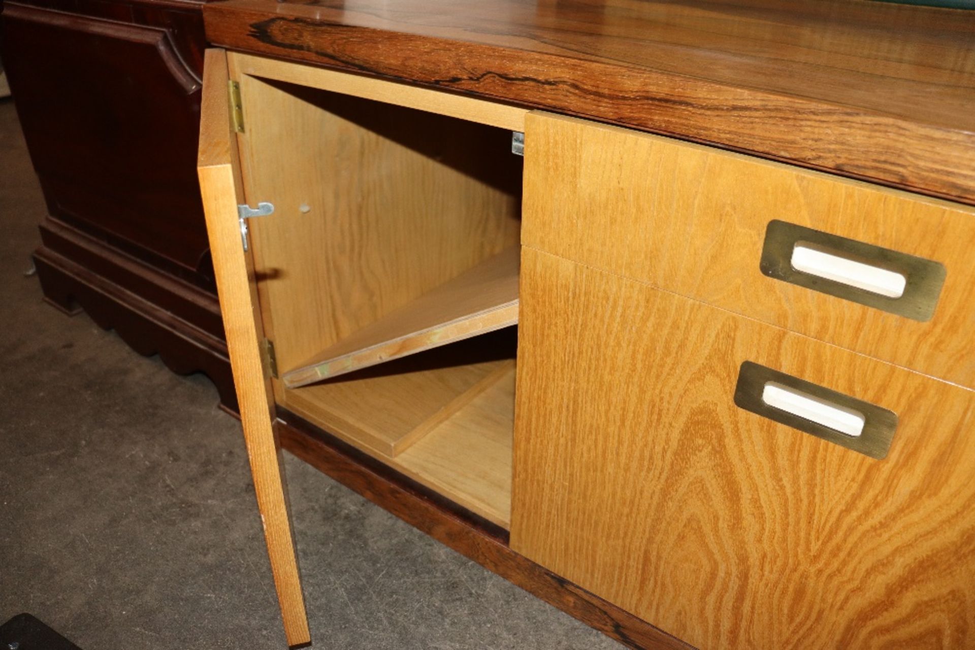 Desmond Ryan, a 1970's rosewood side cabinet fitted adjustable glass shelves and cupboards below, - Image 21 of 26