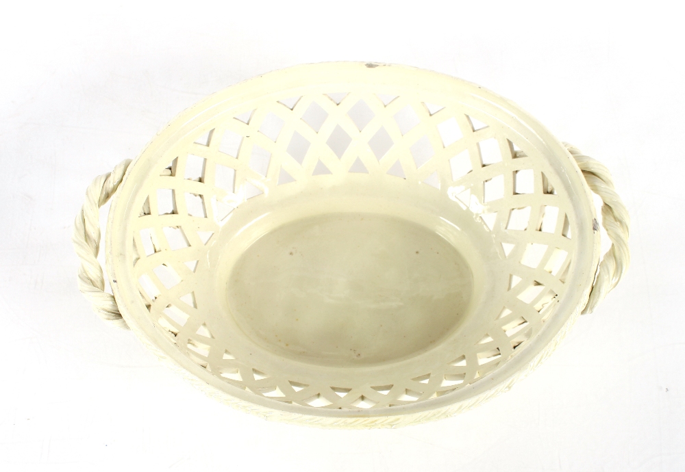A 19th Century cream ware basket and cover with fruit finial, flanked by twist handles, 27cm long - Image 2 of 9