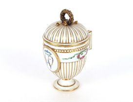 A Meissen chocolate cup and cover, possibly Marcolini period of ribbed baluster form, central