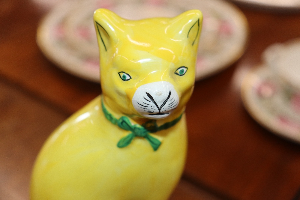 A pair of Staffordshire yellow glazed figures of seated cats on cushions, 20cm high - Image 11 of 18