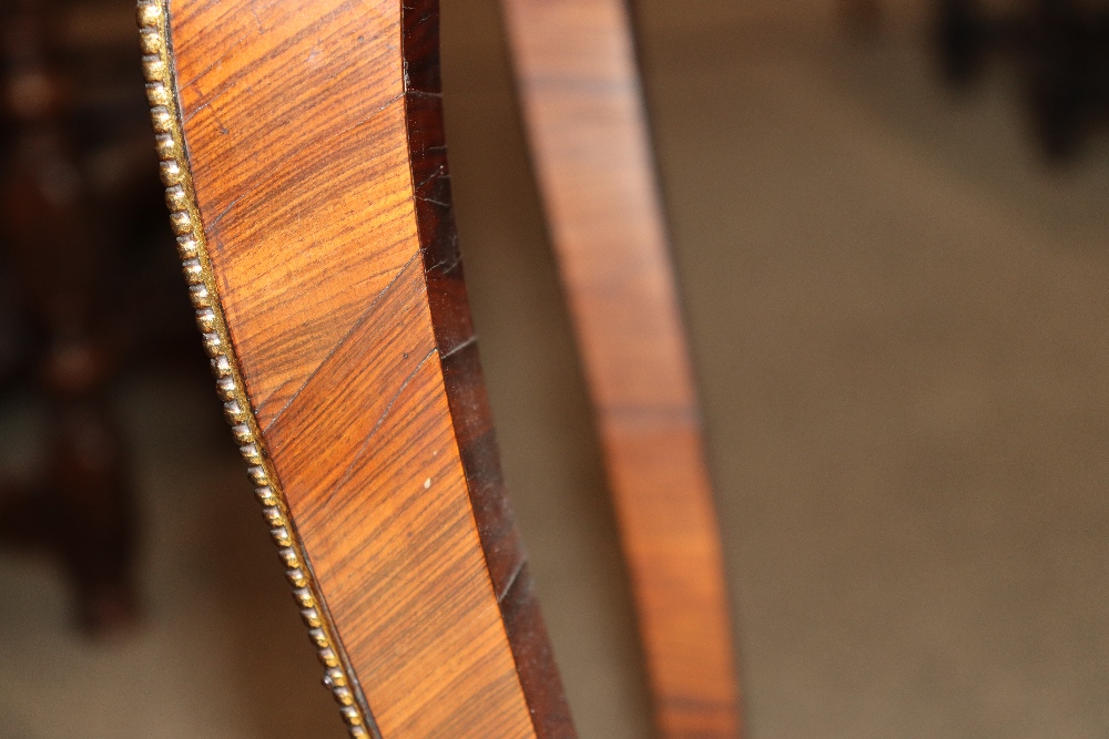 A pair of 19th Century French walnut and cross banded two tier side tables surmounted by pierced - Image 84 of 110