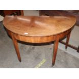 A 19th Century mahogany single drop leaf dining table, raised on square section supports terminating