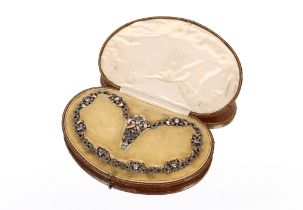A heavy yellow and white metal mounted necklace, set with white stones, 77gms total weight in fitted