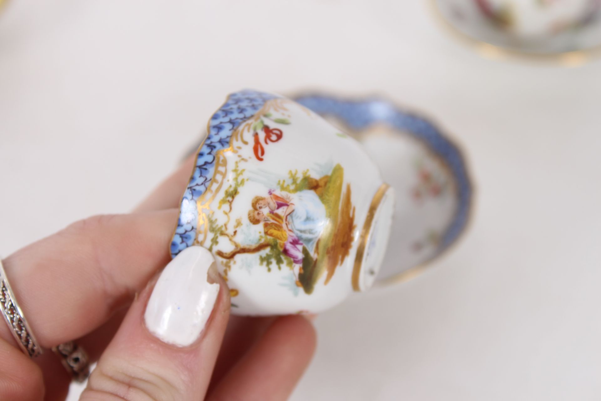 A Meissen inkwell on saucer shaped stand; a pair of matching chamber sticks AF; various miniature - Image 8 of 21