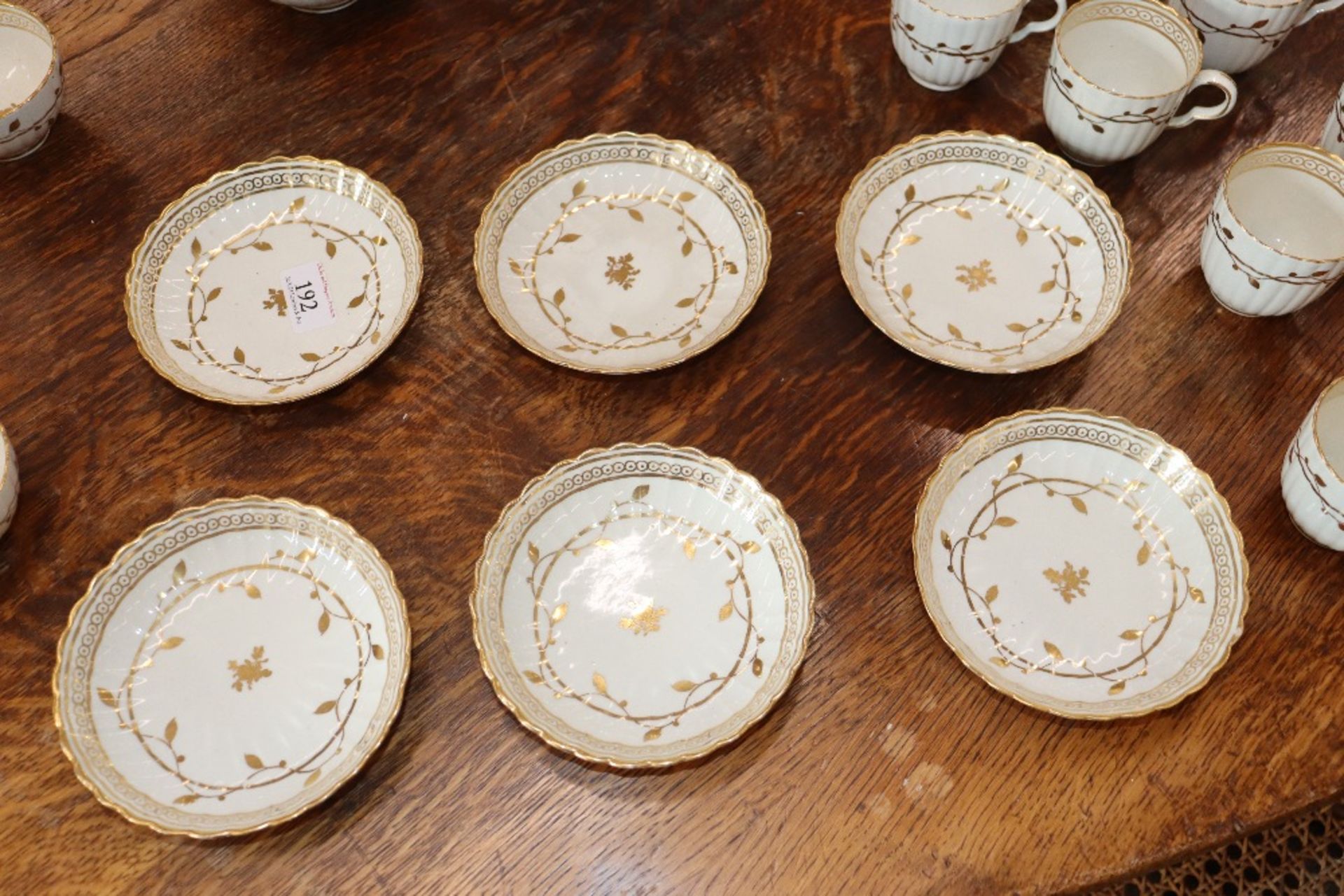 An early 19th Century English porcelain part tea set, of fluted design comprising numerous cups, - Image 31 of 32