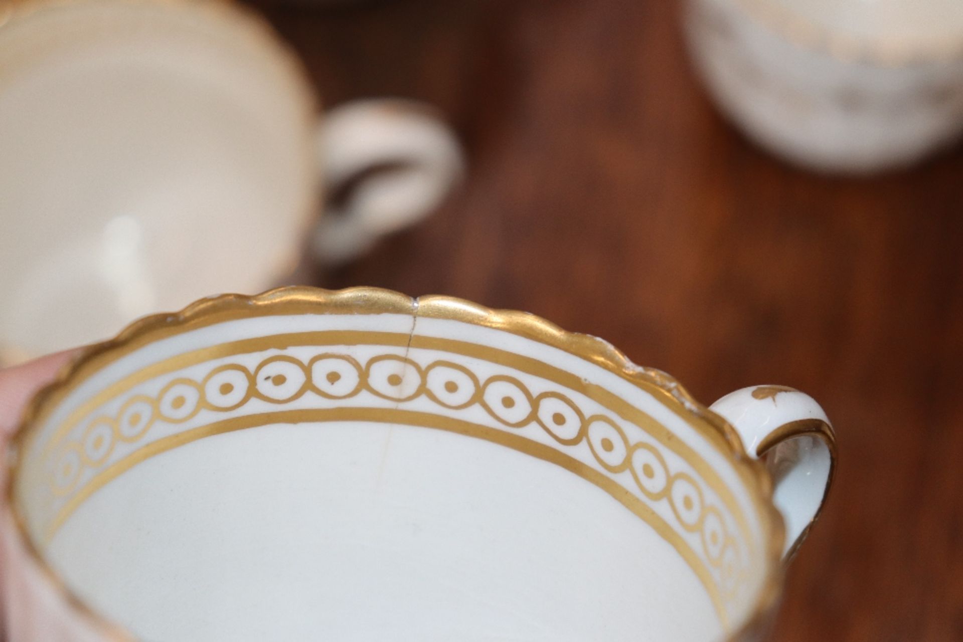An early 19th Century English porcelain part tea set, of fluted design comprising numerous cups, - Image 27 of 32