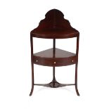 A 19th Century mahogany corner washstand, fitted single drawer raised on out swept supports,