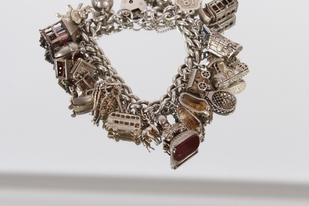 A very large silver charm bracelet, set many charms, 111gms - Image 3 of 5
