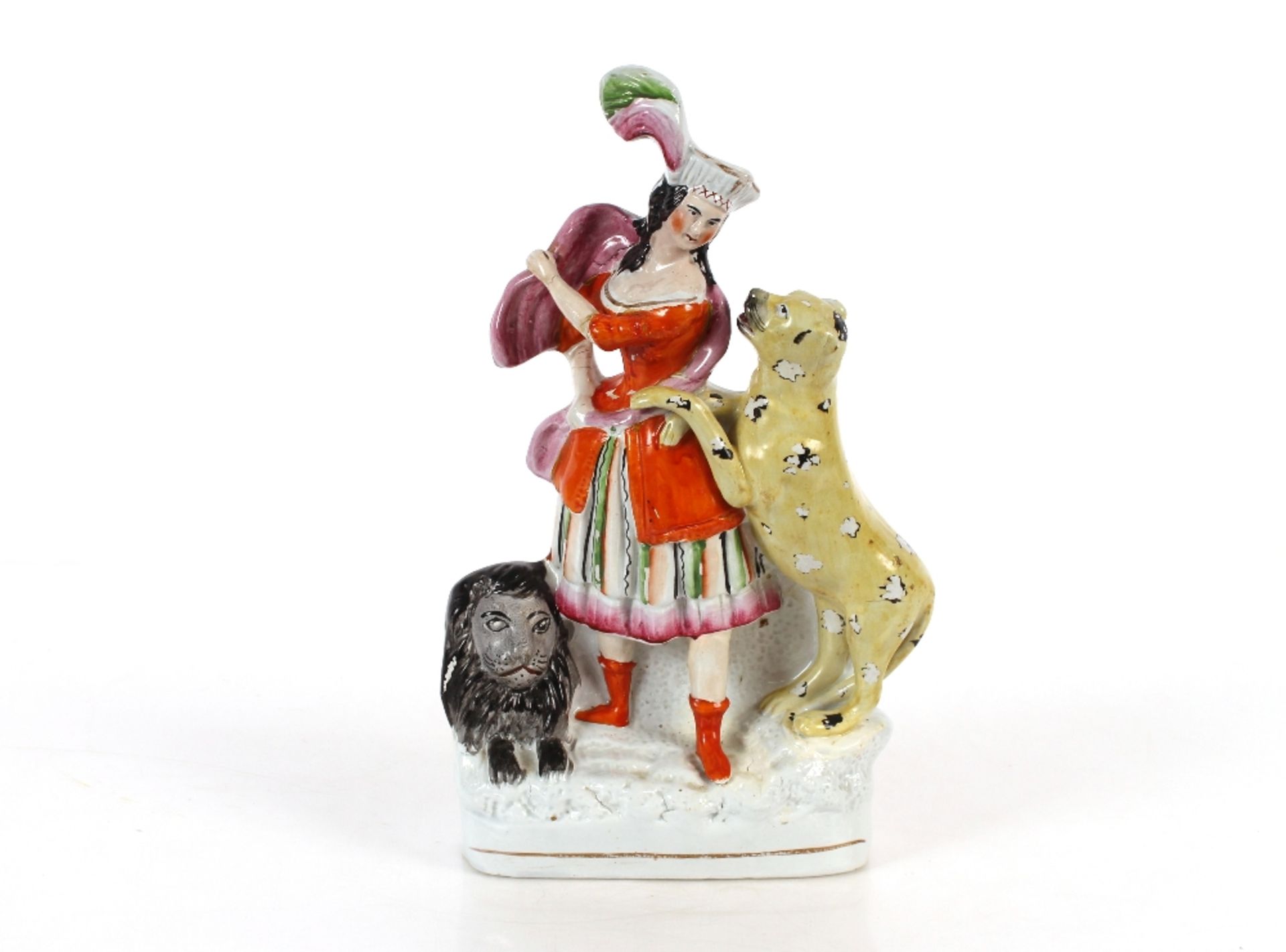 A 19th Century Staffordshire group depicting figure with lion and leopard, 35cm