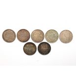 Seven Victorian shillings, ranging from 1867-1900