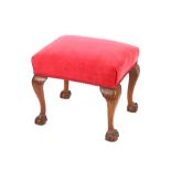 A mahogany framed dressing stool, with red Dralon upholstered seat, raised on cabriole supports,