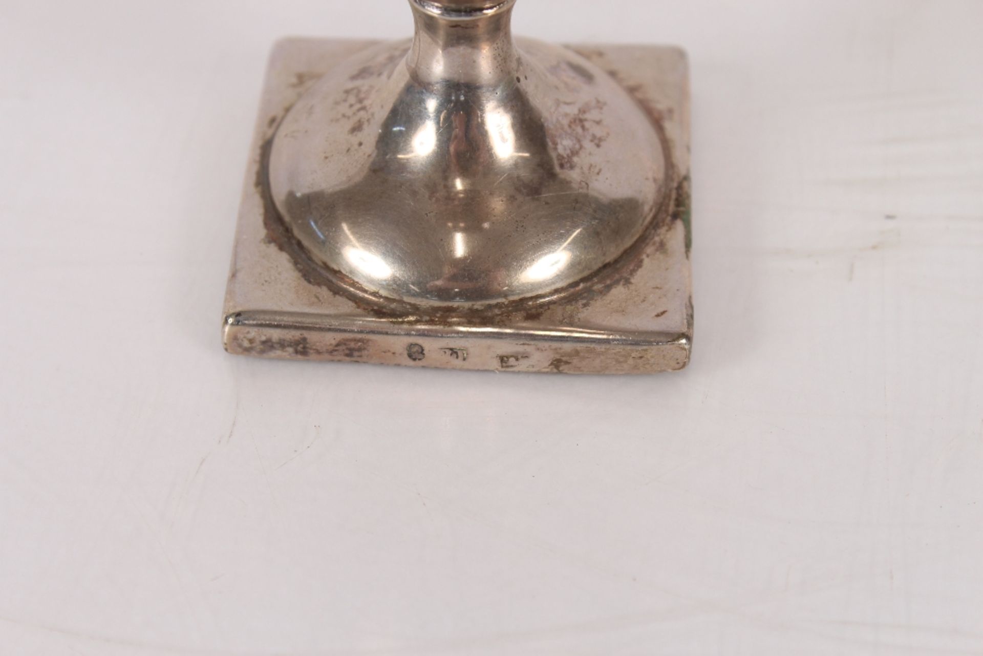 A Georgian silver pedestal cream jug, of plain form with looped handle, spread foot and square base, - Image 2 of 2