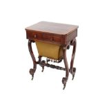 A 19th Century mahogany and cross banded sewing table, fitted with a single drawer and pull out