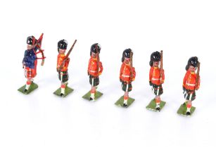 A collection of Britains lead soldiers, mostly Guards Regiments and a hunting group