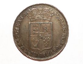 A William and Mary half crown, Caul frosted, with pearls first reverse
