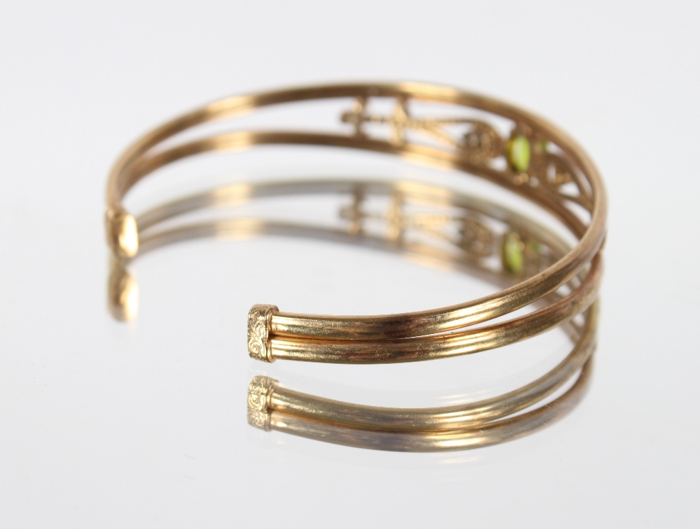 A 9ct gold peridot and white stone bangle, 10.7gms - Image 4 of 6