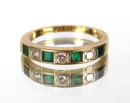 An 18ct gold emerald and diamond half eternity ring AF, 3gms, ring size N/O