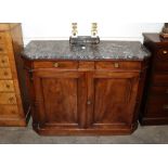 A 19th Century mahogany side cabinet surmounted by a grey marble top above two short drawers,