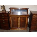 A 19th Century rosewood chiffonier, having raised mirrored gallery back, shelves below enclosed by a