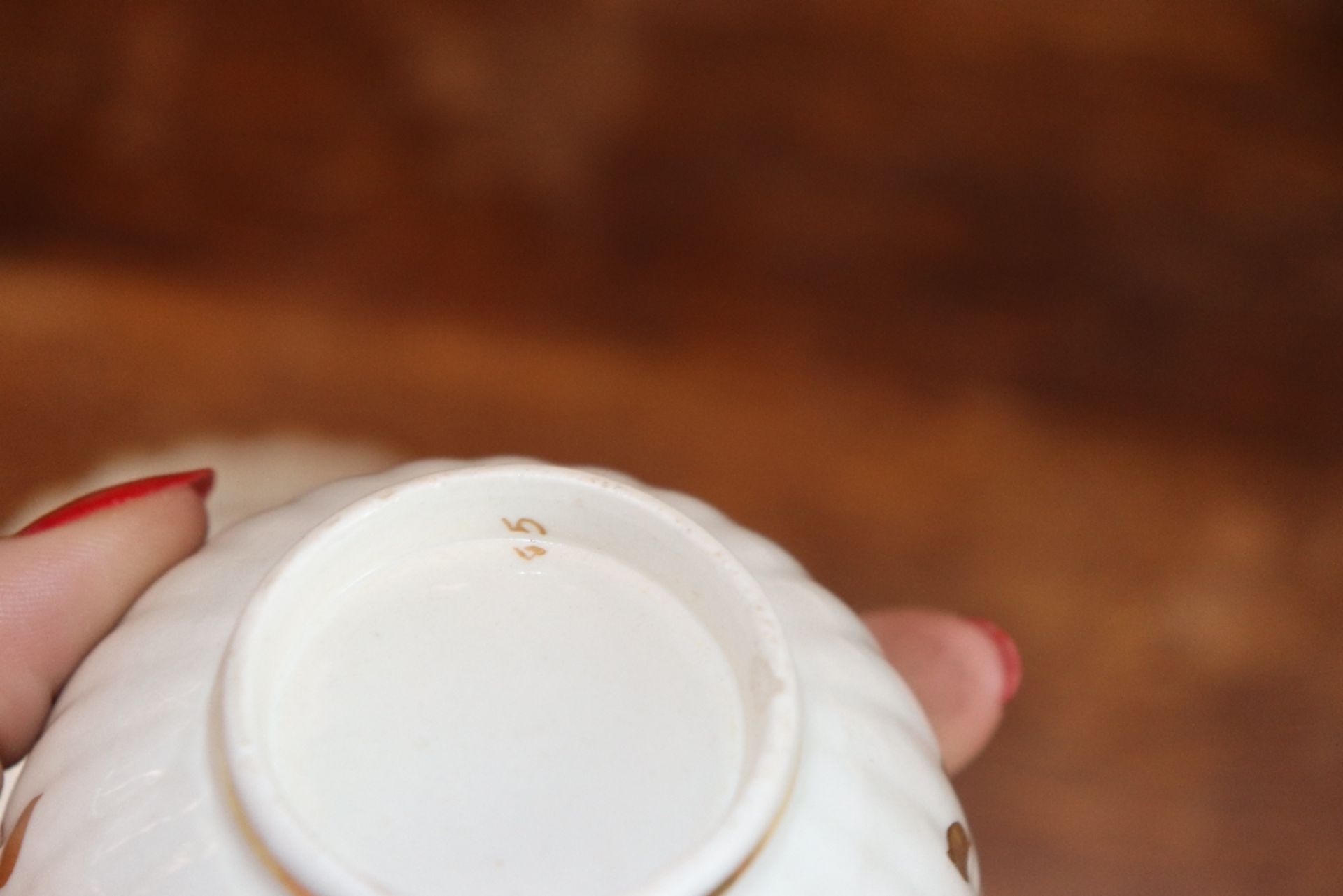 An early 19th Century English porcelain part tea set, of fluted design comprising numerous cups, - Image 13 of 32