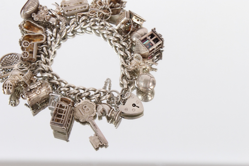 A very large silver charm bracelet, set many charms, 111gms - Image 5 of 5