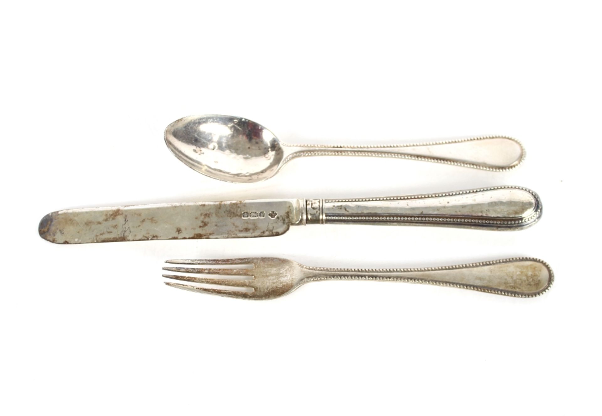 A Victorian silver Christening fork and spoon, London 1867; and a similar pattern knife, Sheffield