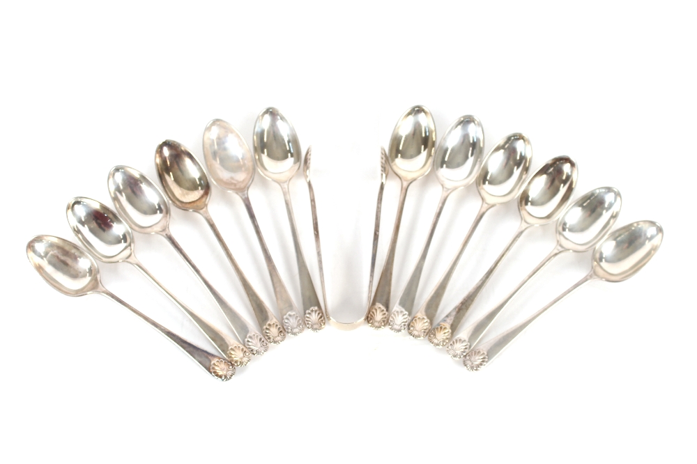 A set of twelve late Victorian silver teaspoons with shell decorated terminals, London 1894; and a