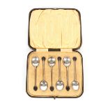 A cased set of six silver bean topped coffee spoons