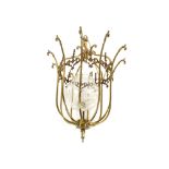 A decorative brass hanging lamp, having raised foliate and scroll decoration, 55cm overall