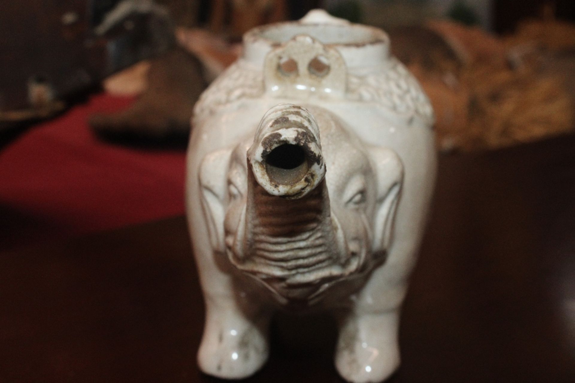A Chinese blanc de chine water dropper in the form of an elephant, having moulded decoration to - Image 6 of 21