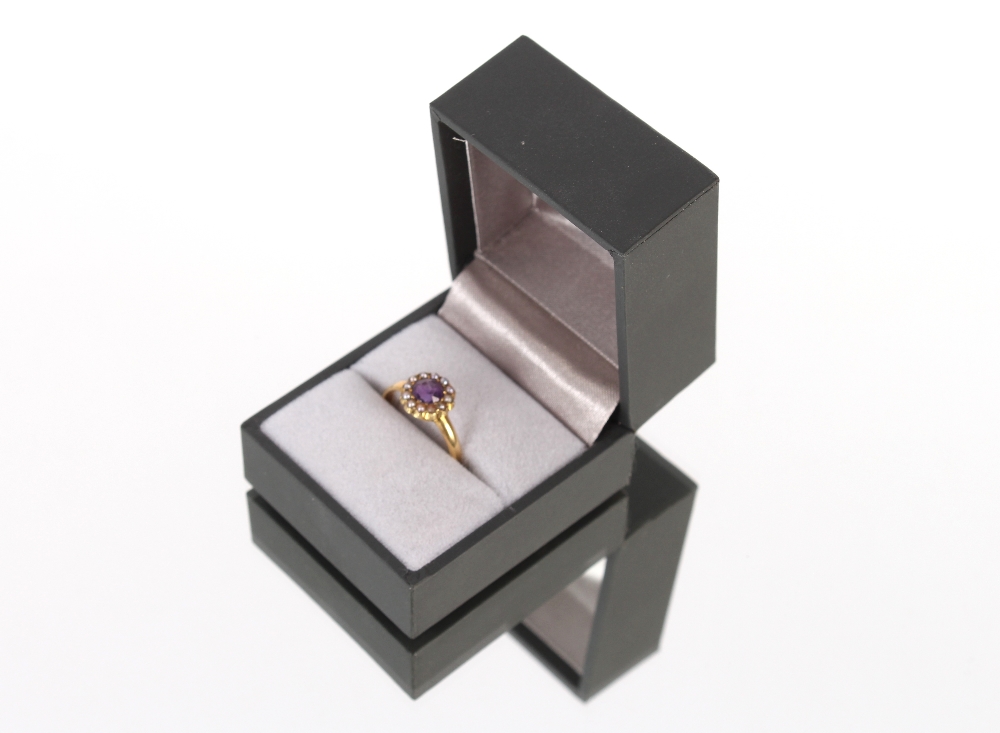 A seed pearl and amethyst set ring, 18ct gold mount, 2.5gms - Image 2 of 3