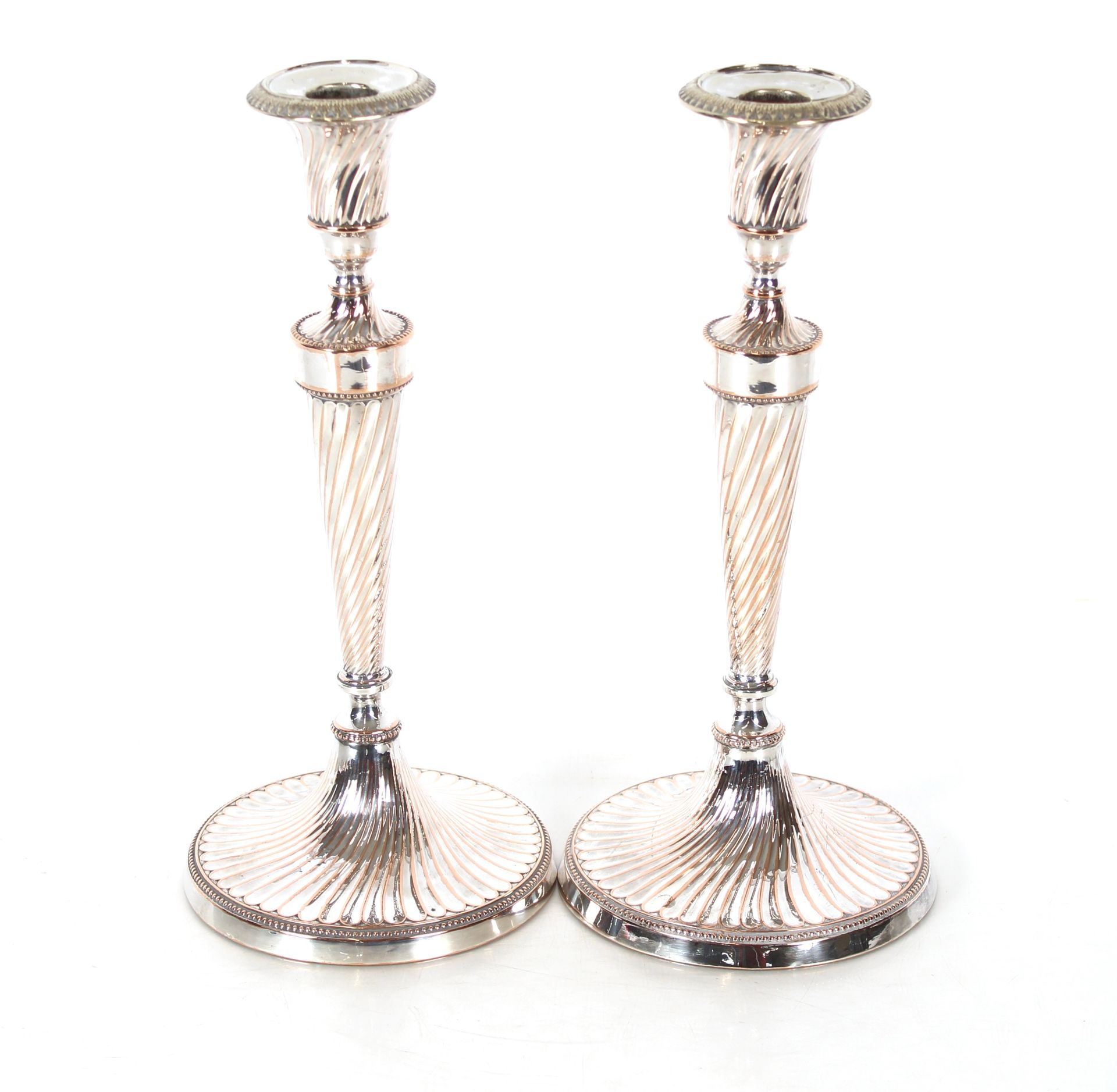 A pair of plate on copper candlesticks, Campana sh